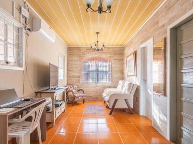 Terreno 10x30 com 2 casas no pátio à venda, por R$425.000 Bairro Monte Carlo Cachoeirinha/RS