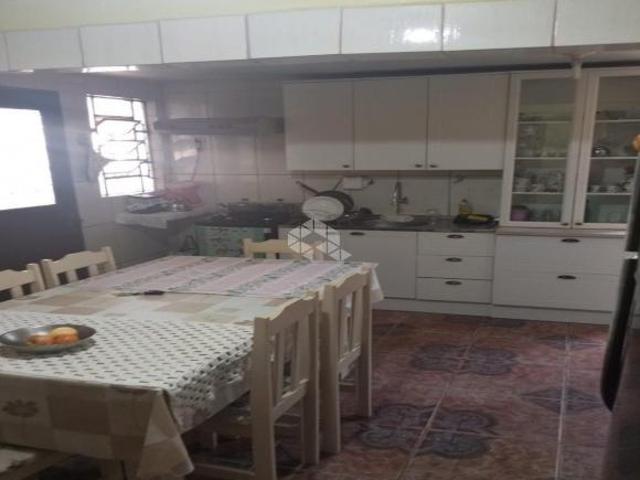 Terreno 596m² com casa construída, no Bairro Olaria em Canoas