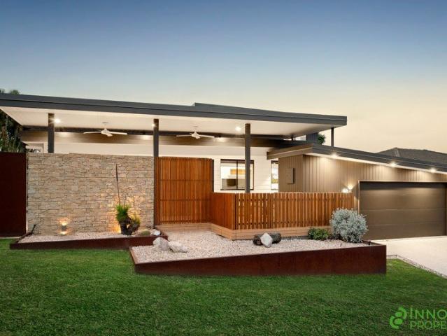 Thoughtfully Re imagined & Architecturally Enhanced Split Level Residence With Premium Entertaining Options