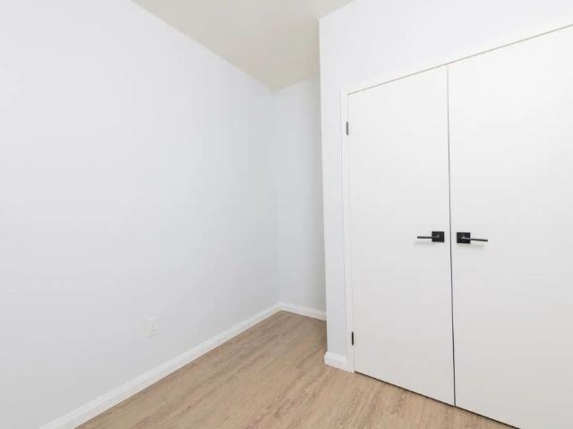 The Carmine — 1 Bedroom + Den