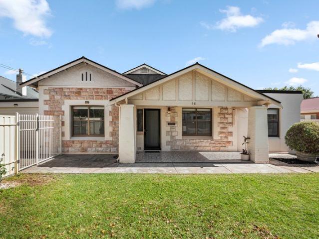 THE CLASSIC BEAUTY FREESTONE FRONTED BUNGALOW THAT PAIRS ITS CHARMING PAST WITH FAMILY FLEXIBILITY AND EASY FUTURE POTENTIAL