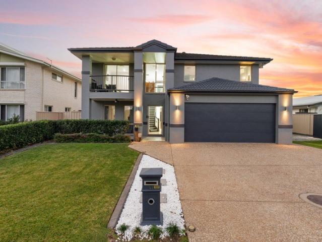 The Benchmark for Luxury Living | One of Central Lakes' Finest Lakefront Residences
