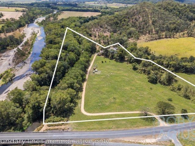 The Brief  Gorgeous Near New Family Home with Creek Frontage on 13.5 acres