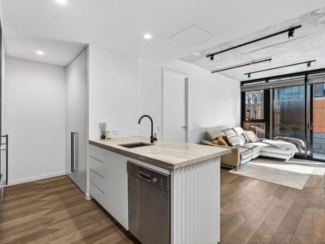 The Brief: Designer West End Apartment with Rare Direct Terrace Access to Pool & BBQ Garden