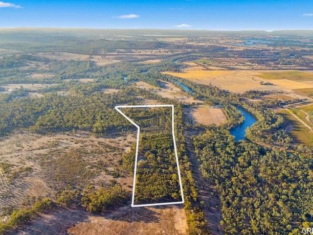 The Brief: Escape the City to Your Own 42.4 Acre Paradise!