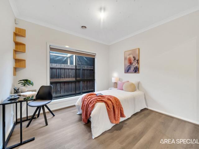 THE BRIEF: Exceptional Family Living with Two Master Suites & Side Access!
