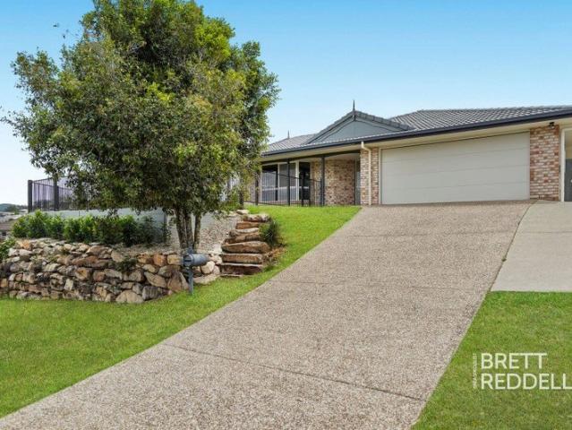 The Brief: Four Bedroom Home with Solar, Multiple Living Areas & Spacious Backyard Ormeau Hills