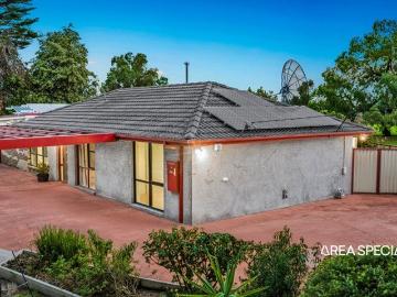 The Brief: Secure & Fully Gated Home with Dual Living Zones!