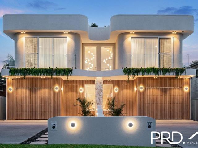 STUNNING DESIGNER HOME ADDJOING YOUR OWN PARKLAND