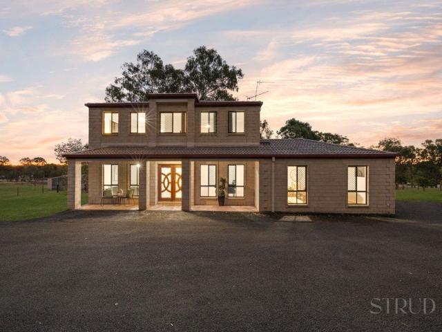 The Full Acreage Package! Huge Family Home, Three Bay Shed, Dam, and Nearly 5 Useable Acres Ready for Cattle or Horses