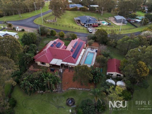 The House Is Big. The Block Is Bigger. The Shed and Pool Seal the Deal