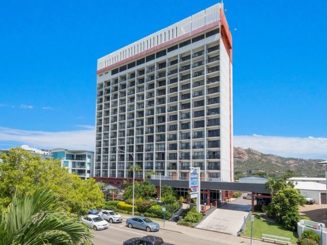THE ONLY ONE OF ITS KIND END UNIT WITH EXTENDED BEACHFRONT DECK
