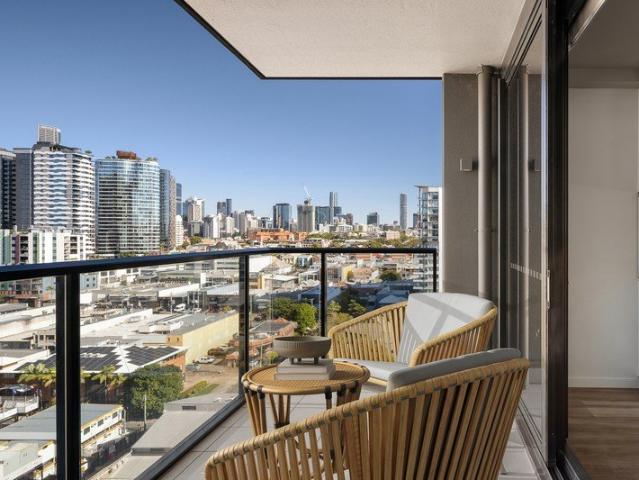 THE OFFR: Rare Corner Residence with Dual Balconies & Two Car Spaces