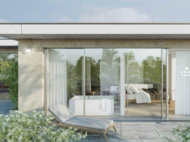 Exklusives Penthouse mit großzügiger Terrasse und Blick ins Grüne