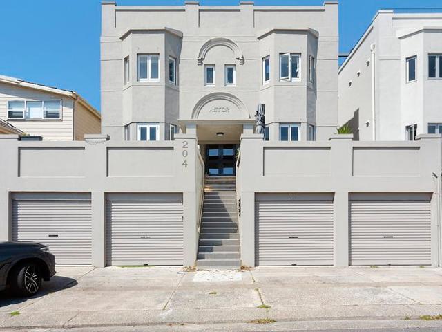 The Perfect Beach Pad In a Breathtaking Ben Buckler Setting with Lock Up Garage + Parking on Driveway