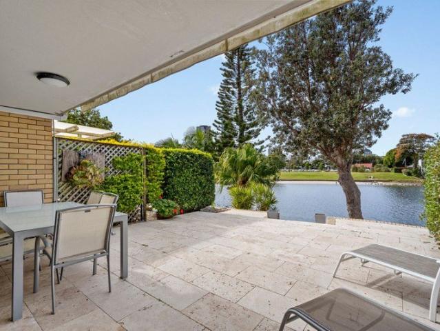 The Perfect Blend of Waterfront Serenity and Low Maintenance Living