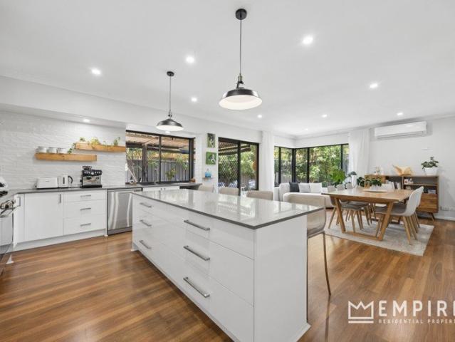 The Perfect Blend of Space and Coastal Living!