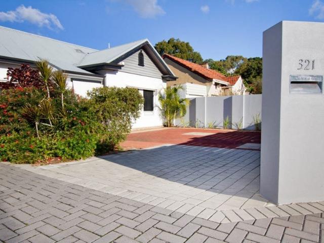 The Perfect City Pad Encompassing Central Convenience!