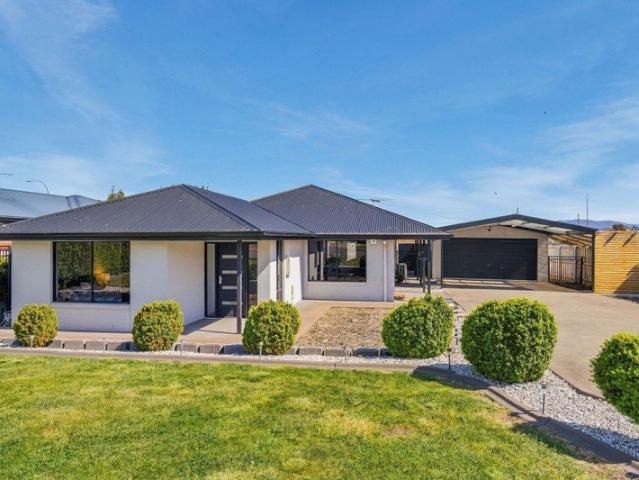 The Perfect Family Home With A Large Garage & Carport