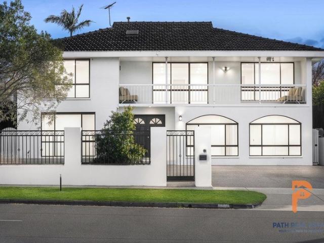 The Perfect Family Upgrade with Five Bedrooms and Multiple Living Zones