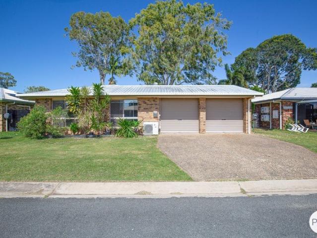 The Perfect First Home Offering Privacy, Space and Easy Care Living with Access to Pool and Tennis Court Offers Over $565,000