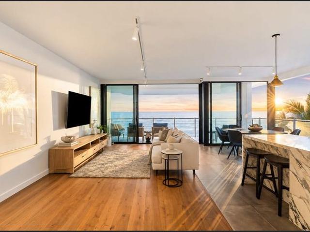 The Pinnacle of Luxury Beachfront Living Offered Furnished OR Unfurnished