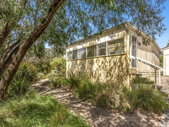 THE QUINTESSENTIAL BEACH HOUSE IN A COVETED LOCATION