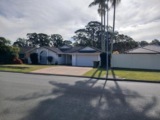THE WHITE HOUSE Master Built brick and texture rendered home at 3 Botanic Drive Laurieton near Queens Lake