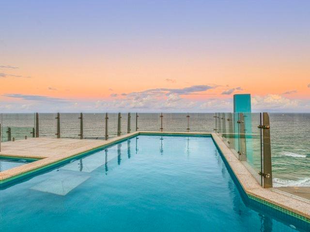 Absolute Beachfront Penthouse Overseas Sellers