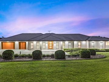 The Ultimate Acreage Lifestyle with Resort Style Pool
