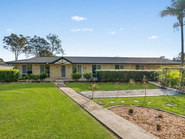 The Ultimate Acreage Package: Dual Street Access, Modern Living & Premier Convenience