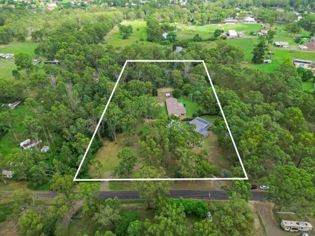 The Ultimate Dual Living Estate: Two Homes, Two Sheds, Five Prime Acres