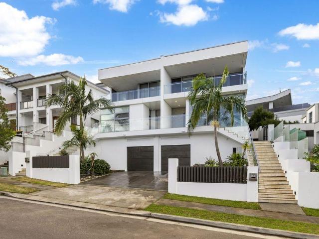 THE ULTIMATE ENTERTAINERS HOME WITH 4 CAR GARAGE & POOL