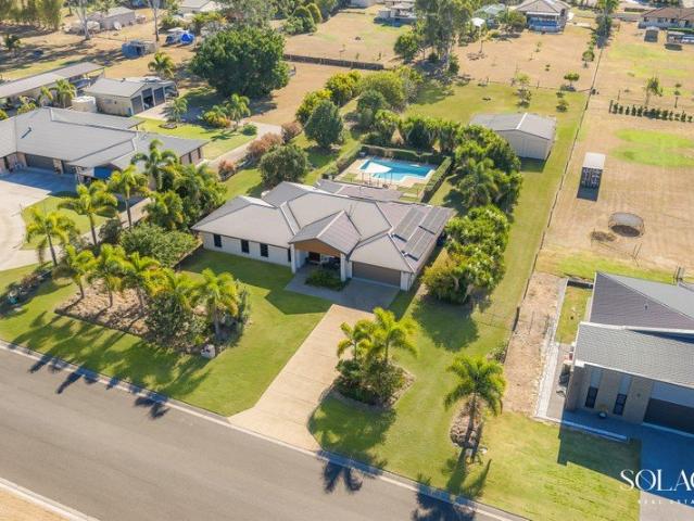 The ultimate family on 1 acre in the highly sought after Country Club Estate