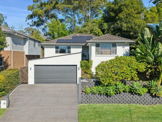 The ultimate family entertainer with four car garage and half basketball court