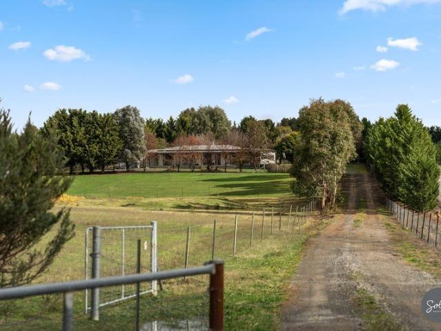 The ultimate multi gen estate: 2 homes, nearly 5 acres, and a private indoor pool complex