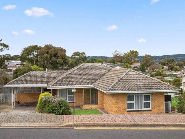 The Ultimate Renovator's Delight with Hills Views & High Potential