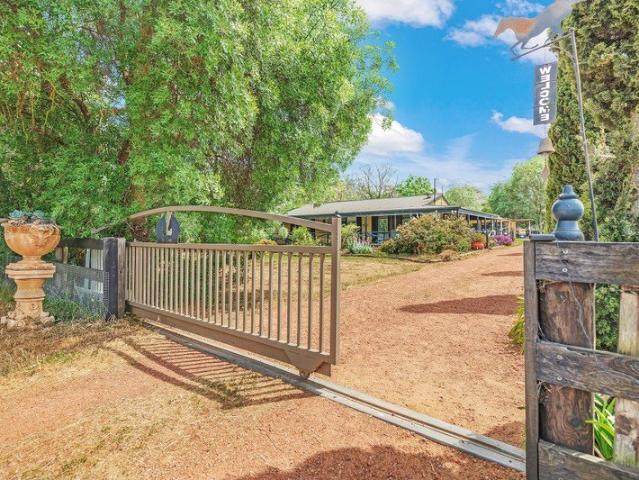 The Ultimate Rural Lifestyle with Modern Comforts on 4.8 Acres!