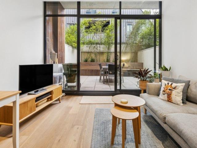 The Ultimate Walk to Everywhere Lifestyle with a Secluded Courtyard