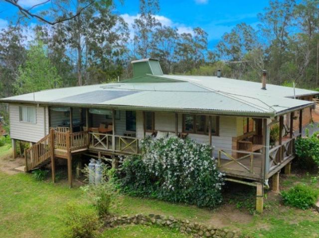 The Ultimate Tree Change 18 acres of endless possibility with a sprawling family home & Spring Fed Creek
