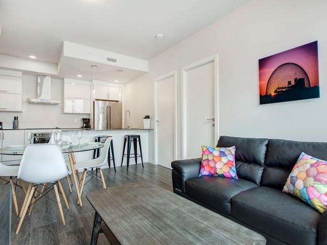 The Village Montreal Furnished Condo Rental at Rubic Chic 2 Bedroom Suite with Modern Kitchen and Juliette Balcony