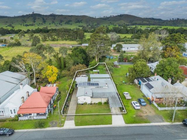 THERE'S MORE THAN MEETS THE EYE WITH THIS PROPERTY LOCATED IN BEAUTIFUL DUNGOG