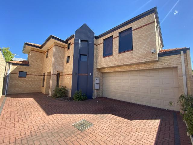 This massive townhouse is sure to impress you!