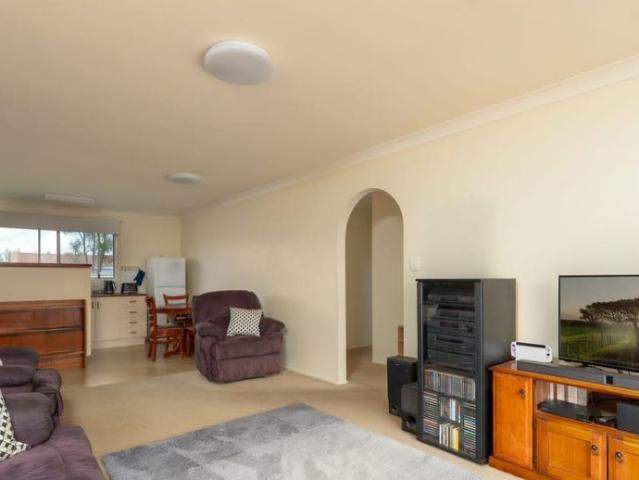 THIS NEAT AND TIDY DUPLEX IN A GREAT LOCATION