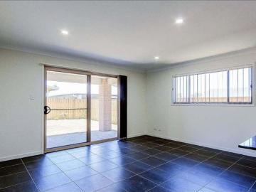 This beautifully designed four bedroom house in Logan Reserve ticks all the boxes