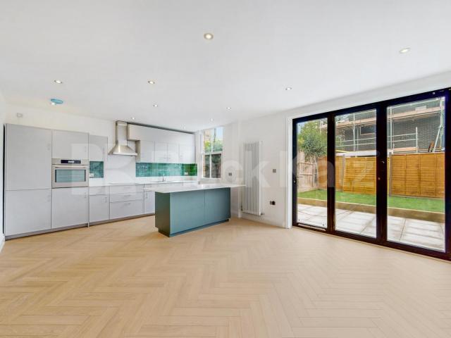 This beautifully renovated three bedroom, two bathroom apartment is ideally located on Sarre Road, NW2, at the West Hampstead end of the street, offering excellent access to the area's popular cafés, restaurants, shops, and transport links.Finished