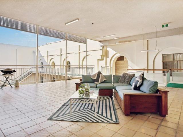 This Expansive Riverfront Building Stands Above the Rest