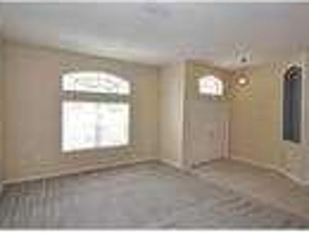This four bedroom, two bathroom home is a rare find