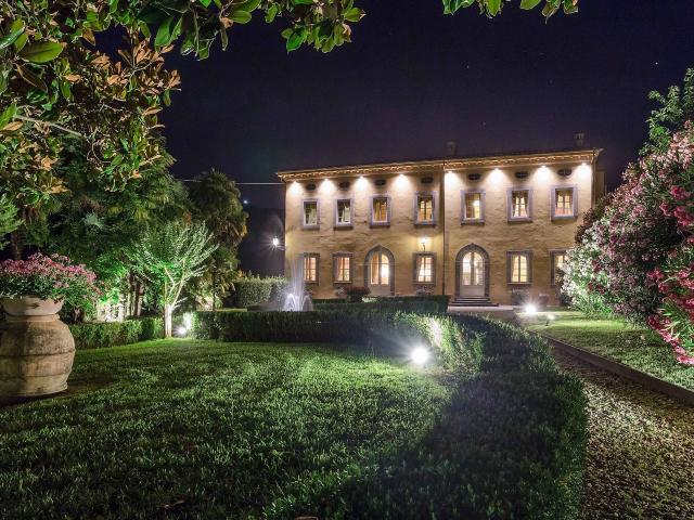 This historic 19th century, Tuscan villa is situated upon a stunning estate of hill terraced olive groves, elegant Italian gardens, and pine forest hilltops with castle ruins. T