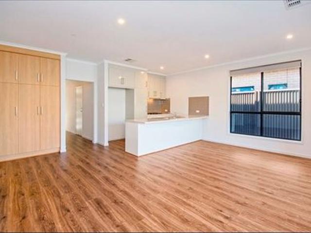 THIS HOME IS LOCATED ON A SECLUDED QUIET STREET OF SPRINGLAKE OVERLOOKING A RURAL SETTING